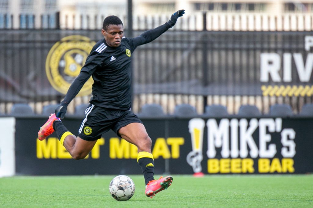 Illal Osumanu clears the ball during the Riverhounds' preseason match against Penn State