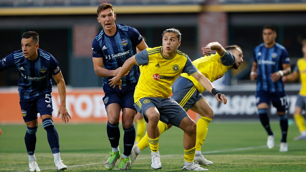 Nate Dossantos battles for the ball in the Riverhounds' 2-0 loss at El Paso Locomotive FC on April 22, 2023 at Southwest University Park in El Paso, Texas