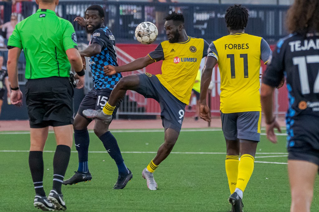 Riverhounds striker Albert Dikwa controls the ball in traffic against the Indy Eleven on August 6, 2022.
