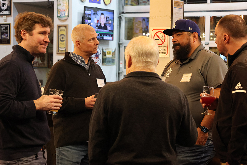 Members of the Riverhounds Business Alliance meet at the RBA's Feburary event at Mike's Beer Bar.