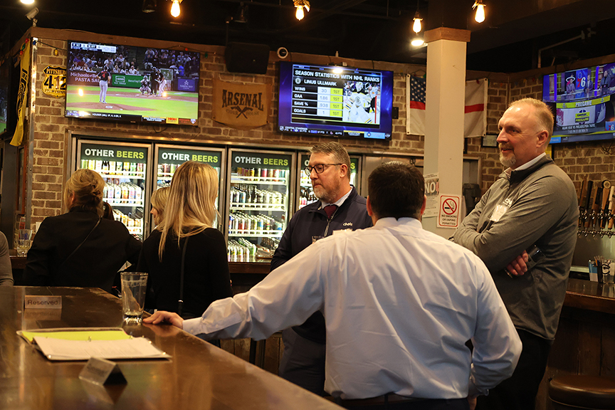 Members of the Riverhounds Business Alliance meet at the RBA's Feburary event at Mike's Beer Bar.