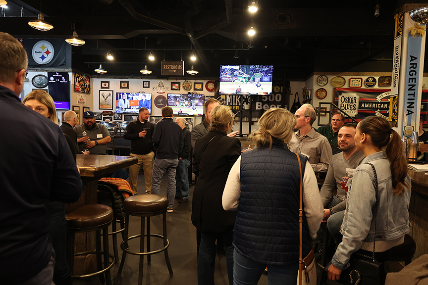 Members of the Riverhounds Business Alliance meet at the RBA's Feburary event at Mike's Beer Bar.