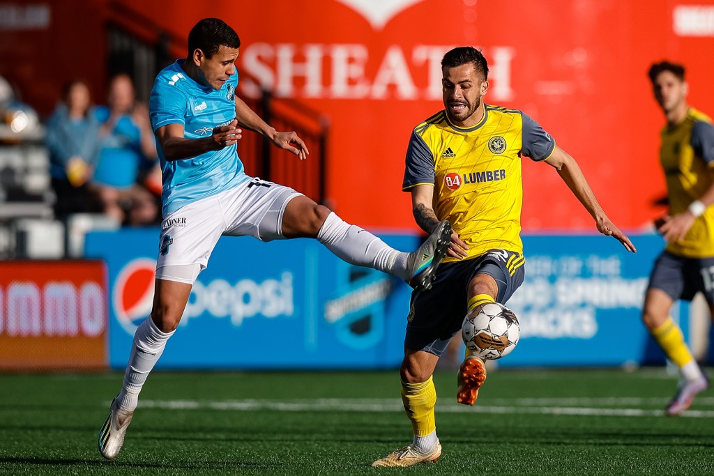 Colorado Springs Switchbacks FC midfielder Stevie Echevarria (13) and Pittsburgh Riverhounds SC forward Tony Lopez (22) battle for the ball in the first half at Weidner Field. Credit: Isaiah J. Downing/Switchbacks FC