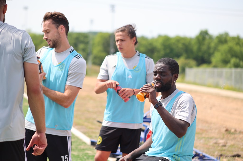 Pittsburgh Riverhounds SC players cool off after training Saturday, May 27 at D.C. United's Inova Performance Complex in Leesburg, Va.