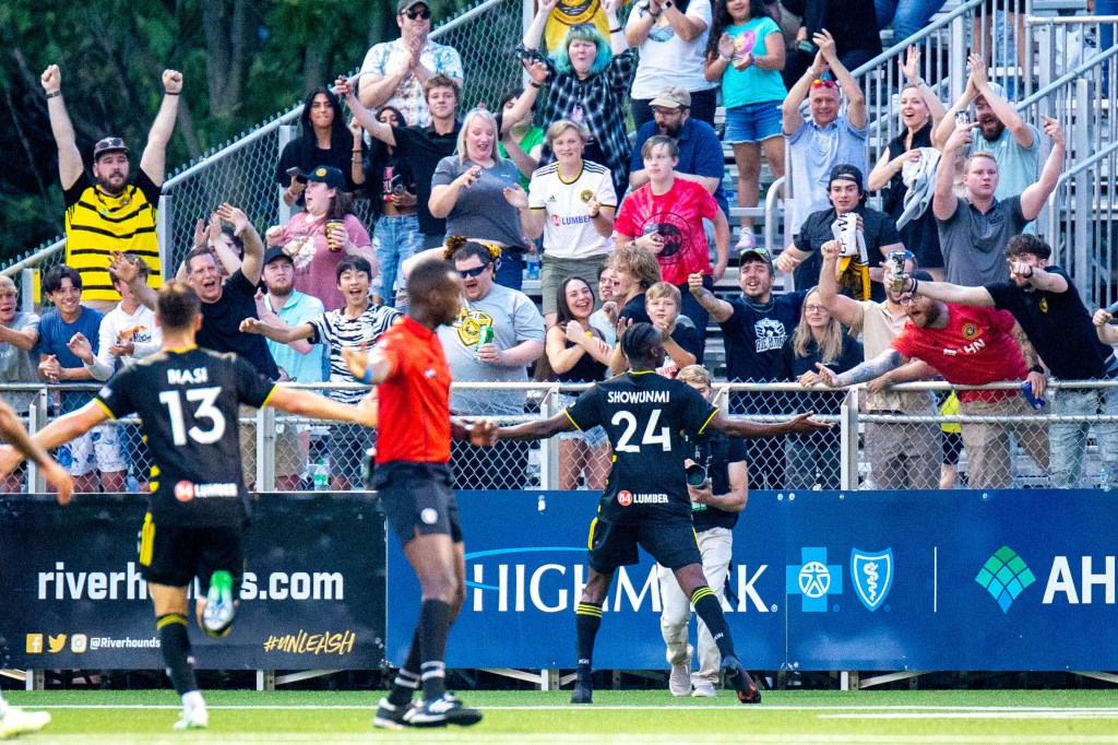 Tola Showunmi celebrates after scoring for the Riverhounds in their 2-0 win over the Charleston Battery at Highmark Stadium on June 10, 2023.