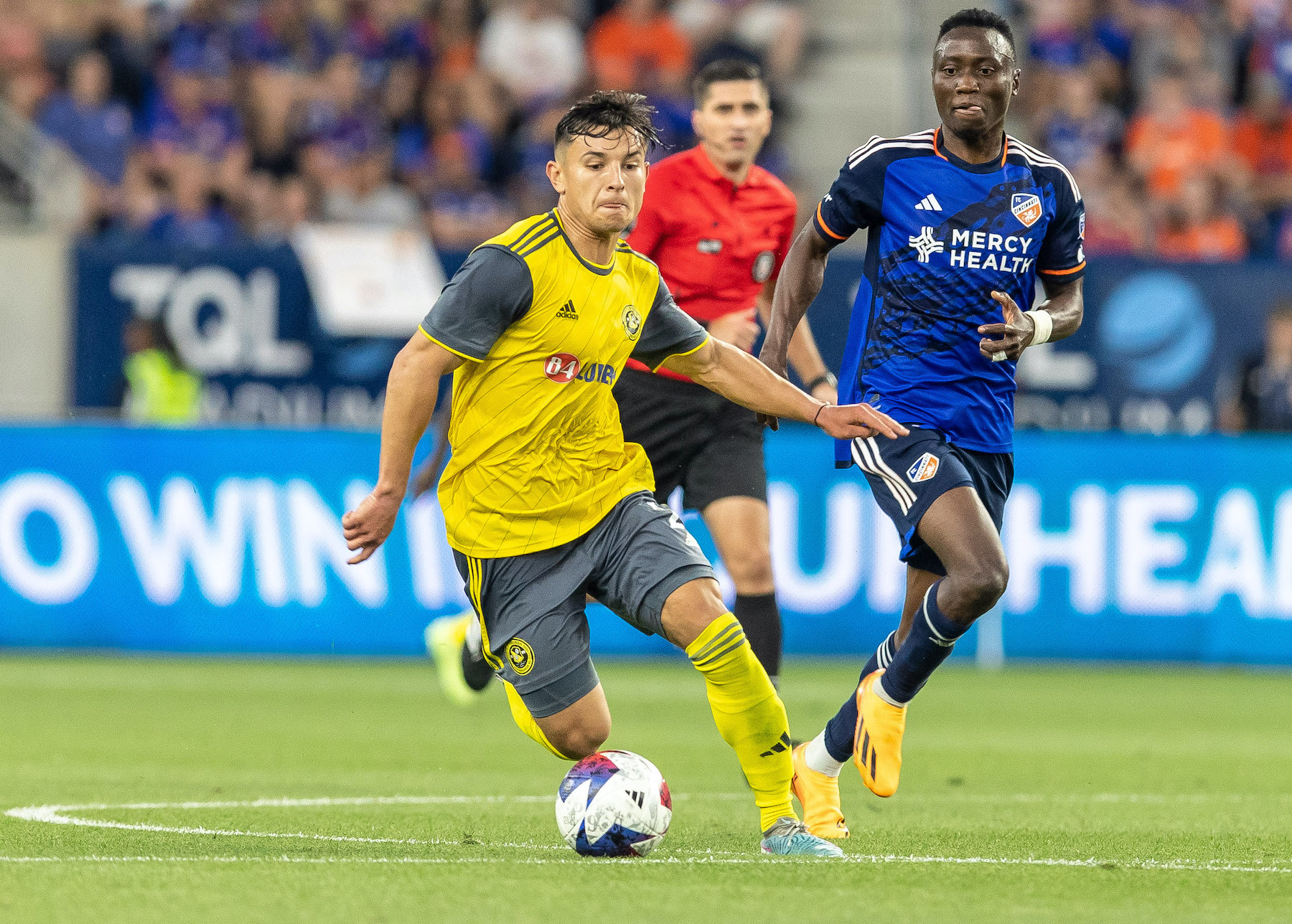 Danny Griffin carries the ball for the Riverhounds in their U.S. Open Cup quarterfinal at FC Cincinnati on June 6, 2023 at TQL Stadium in Cincinnati