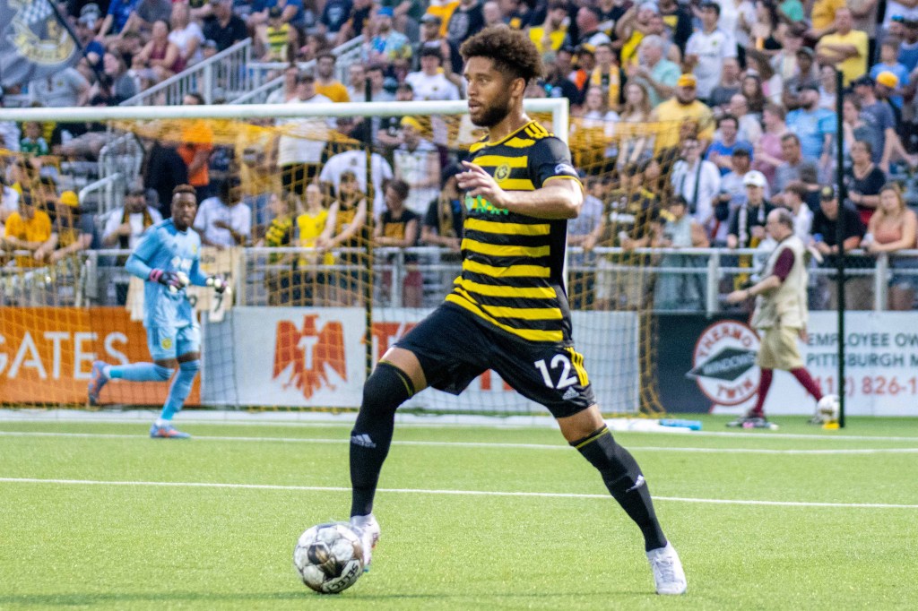 Michael DeShields dribbles the ball for the Riverhounds in their 2-0 win over Detroit at Highmark Stadium on July 15, 2023.