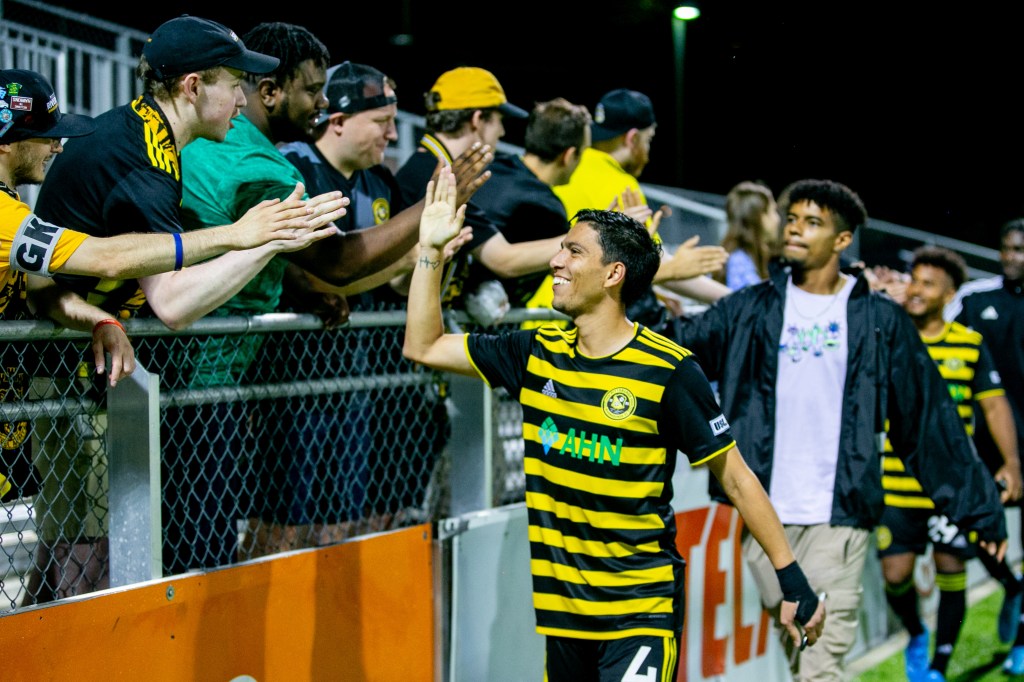 Dani Rovira shakes hands with the fans after the Riverhounds' 2-0 win over Hartford Athletic on Aug. 12, 2023, at Highmark Stadium.