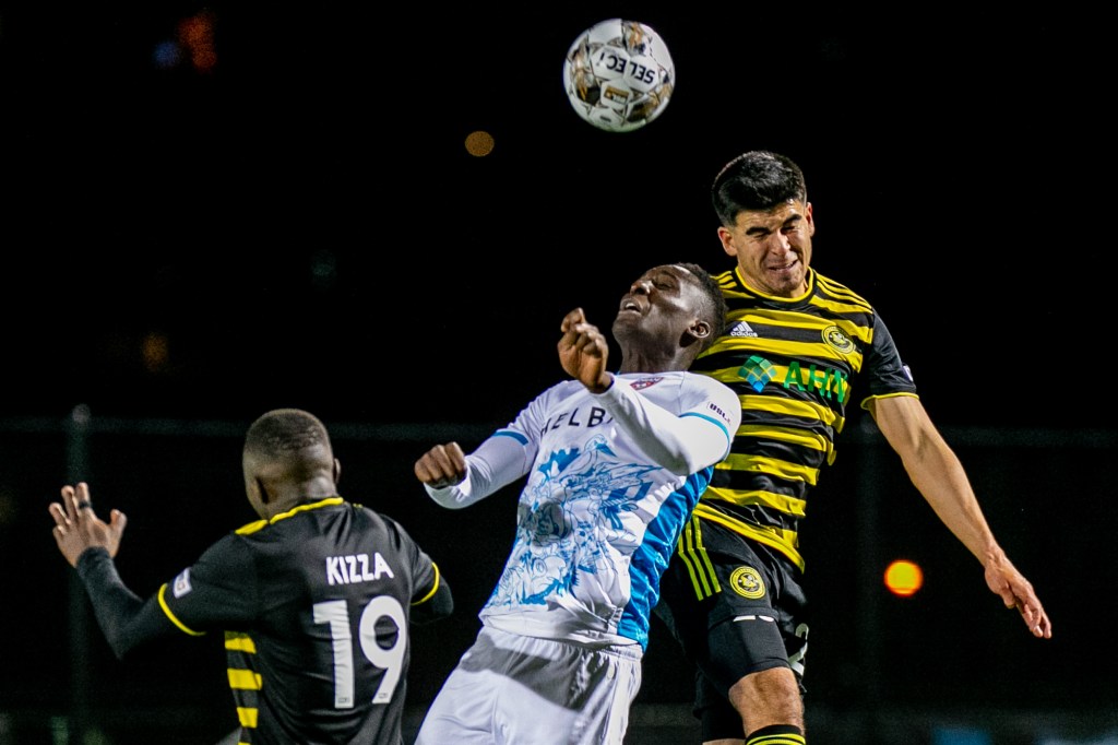 Riverhounds midfielder Marc Ybarra jumps to win a header against Miami FC in the teams' 1-1 draw March 24, 2023, at Highmark Stadium.