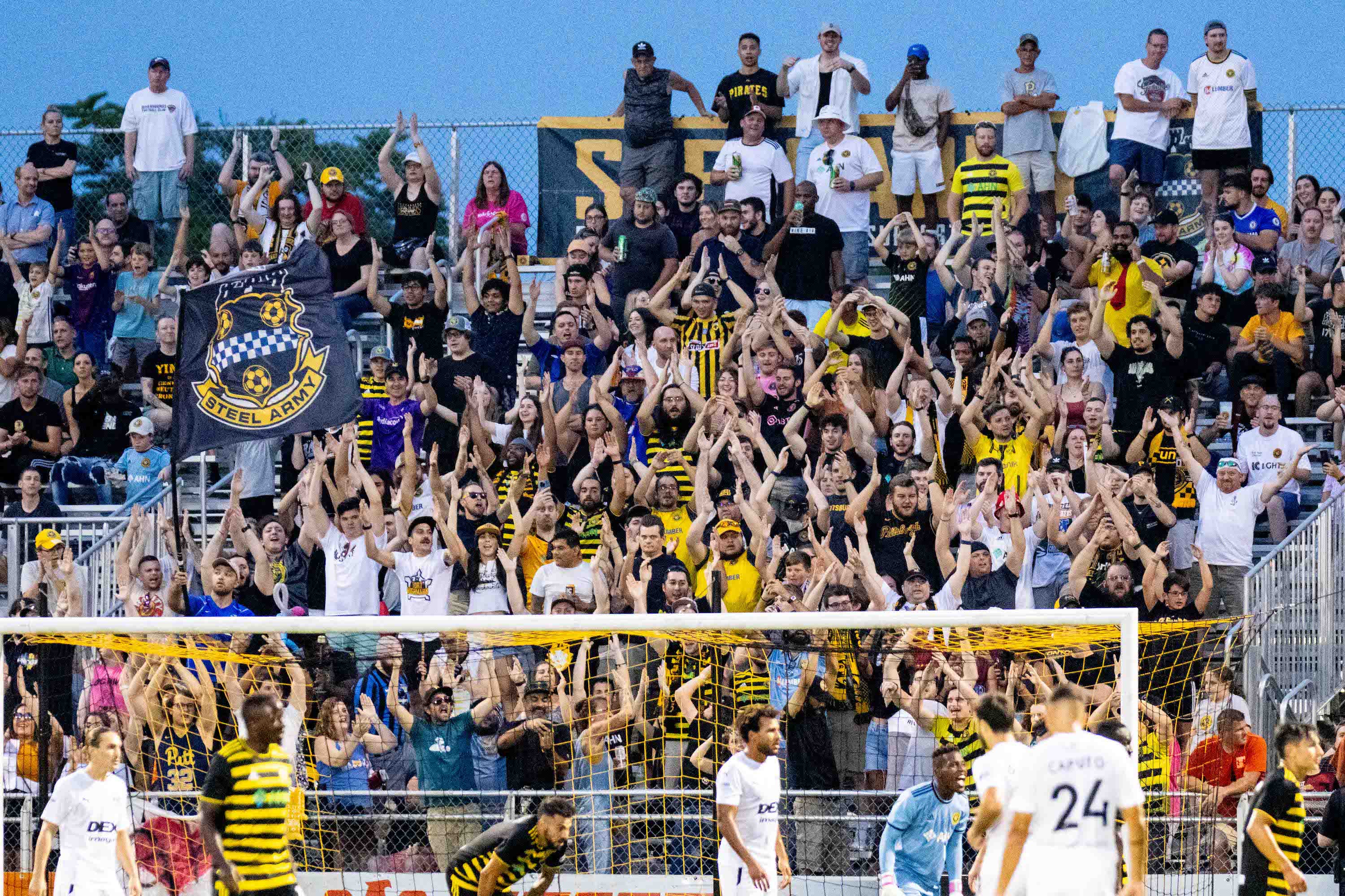 Fans in the Paul Child Stand cheer during the Riverhounds' 1-0 win over the Tampa Bay Rowdies on Aug. 5, 2023 at Highmark Stadium.