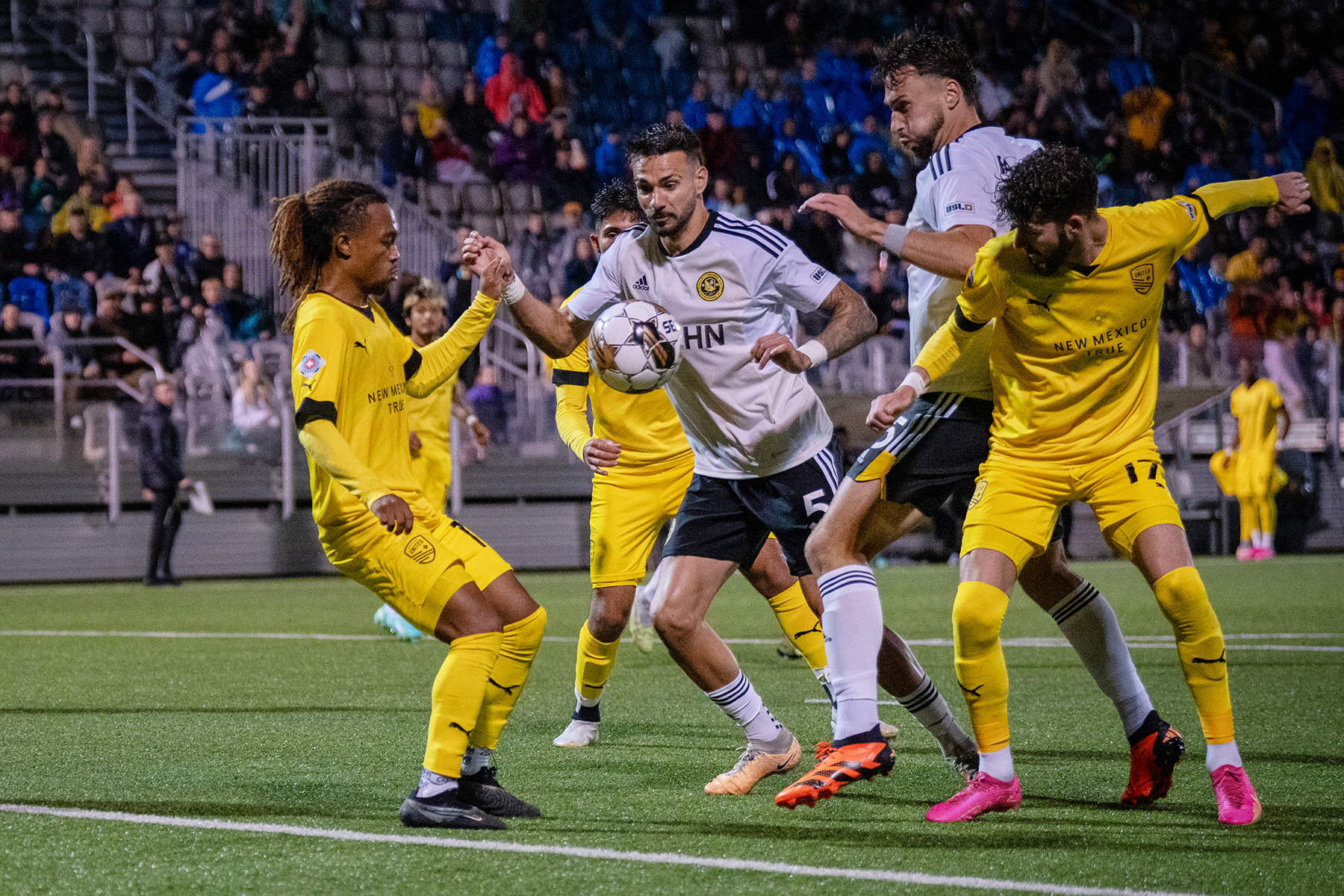 Riverhounds defenders Arturo Ordóñez and Joe Farrell battle for the ball in the team's 2-1 win over New Mexico United on Sept. 23, 2023 at Highmark Stadium.