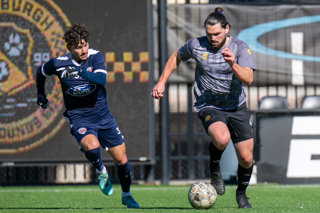 Riverhounds midfielder Jackson Walti dribbles the ball against Indy Eleven in a preseason match at Highmark Stadium on Feb. 6, 2024.