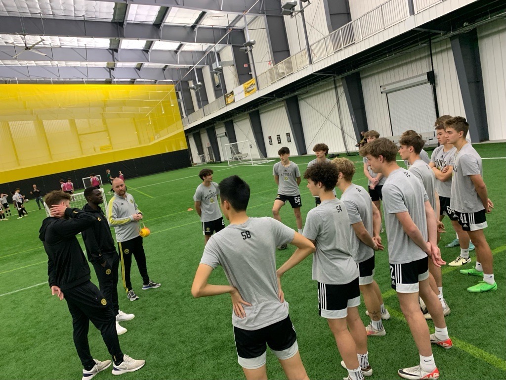 Hounds pro team players Pat Hogan and Babacar Diene visit with the Hounds' 2007 Boys ECNL team during training at AHN Montour.