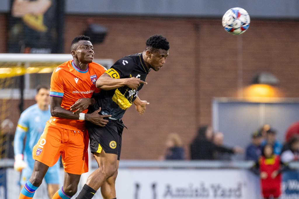Pittsburgh Riverhounds center back Illal Osumanu heads the ball clear against Miami FC at Highmark Stadium