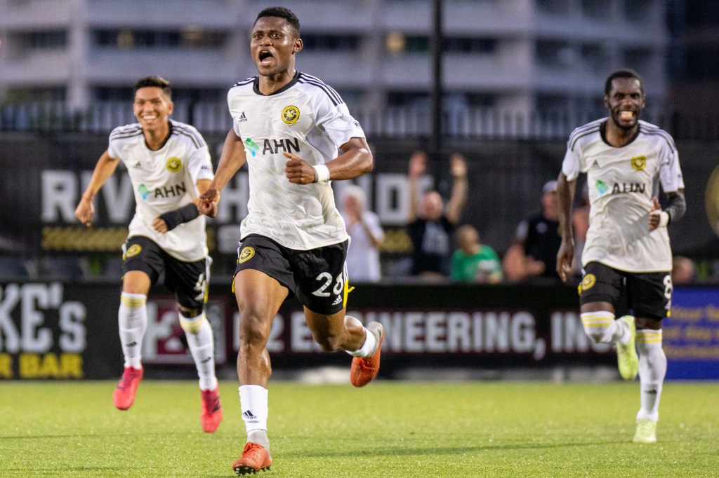 Illal Osumanu sprints toward the Riverhounds bench in celebration of his first career goal, the game winner against San Diego Loyal SC on June 24, 2023 at Highmark Stadium.