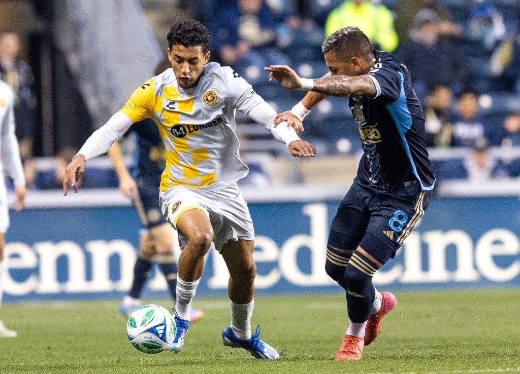 Bertin Jacquesson dribbles around the Philadelphia Union's Jesus Bueno in the Riverhounds' U.S. Open Cup Round of 16 match May 21, 2025 at Subaru Park in Chester, Pa. (Photo: Mallory Neil/Riverhounds SC)
