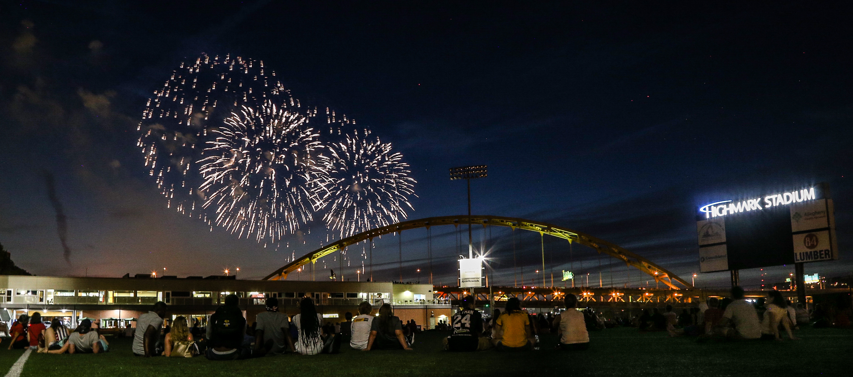Fans sit on the field at Highmark Stadium to watch the City of Pittsburgh fireworks after the Pittsburgh Riverhounds match against the Charlotte Independence on July 4, 2017. (Photo: Chris Cowger/Riverhounds SC)