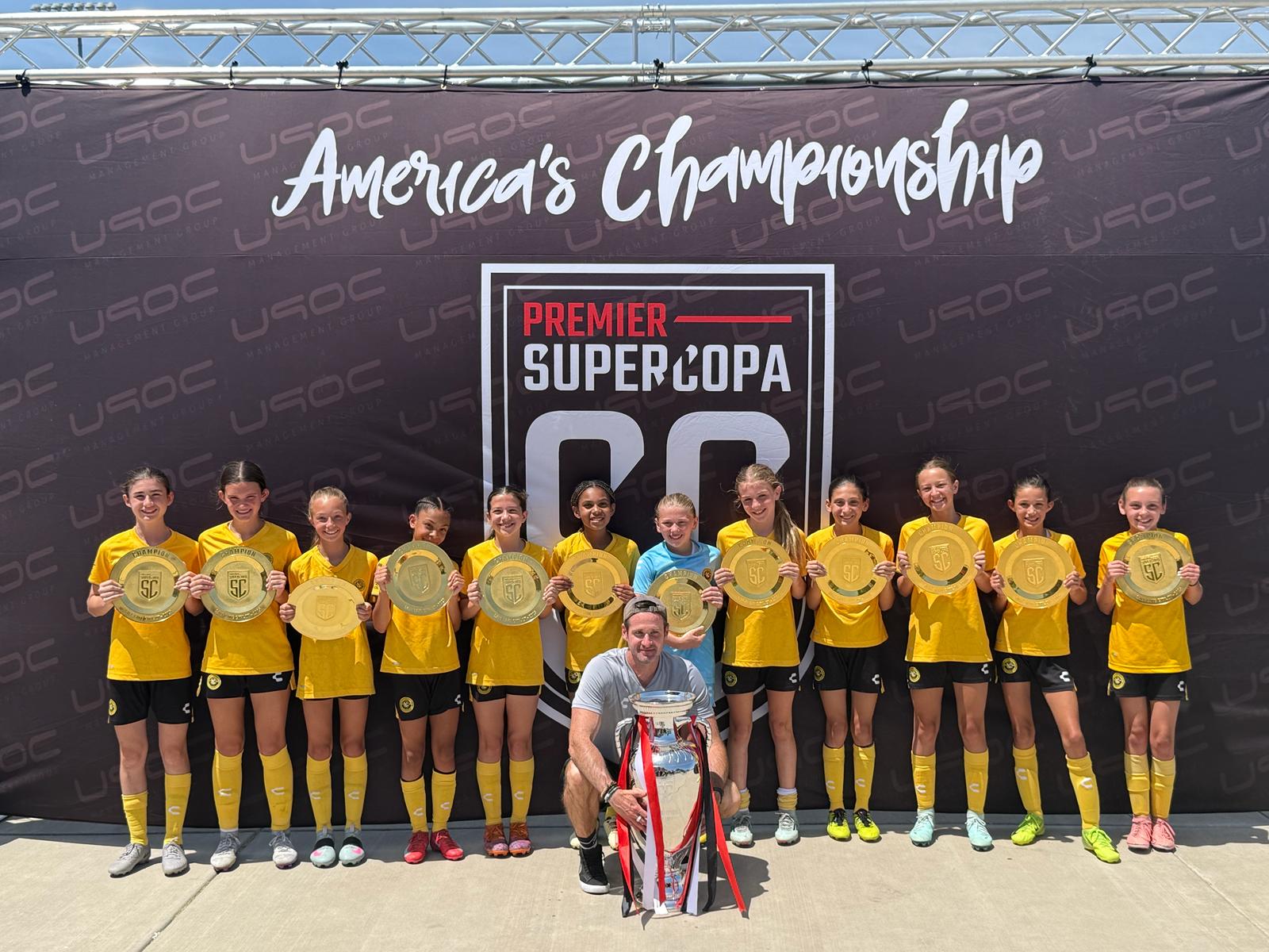 The Riverhounds Development Academy's 2013 Pre-ECNL Girls team, led by coach Jason Kutney (front), won the Premier SuperCopa tournament on June 15, 2025 in Salt Lake City. (Submitted photo)
