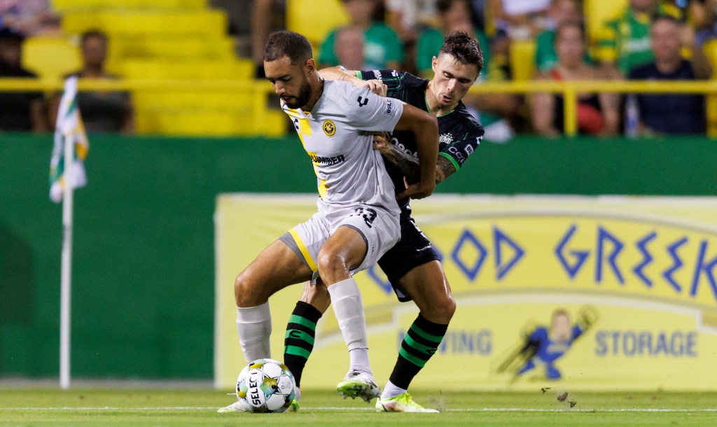 Riverhounds defender Guillaume Vacter shields the ball away from the Tampa Bay Rowdies' Paul Marie in the teams' match Aug. 30, 2025 at Al Lang Stadium in St. Petersburg, Fla. (Photo: Morgan Tencza/Tampa Bay Rowdies)