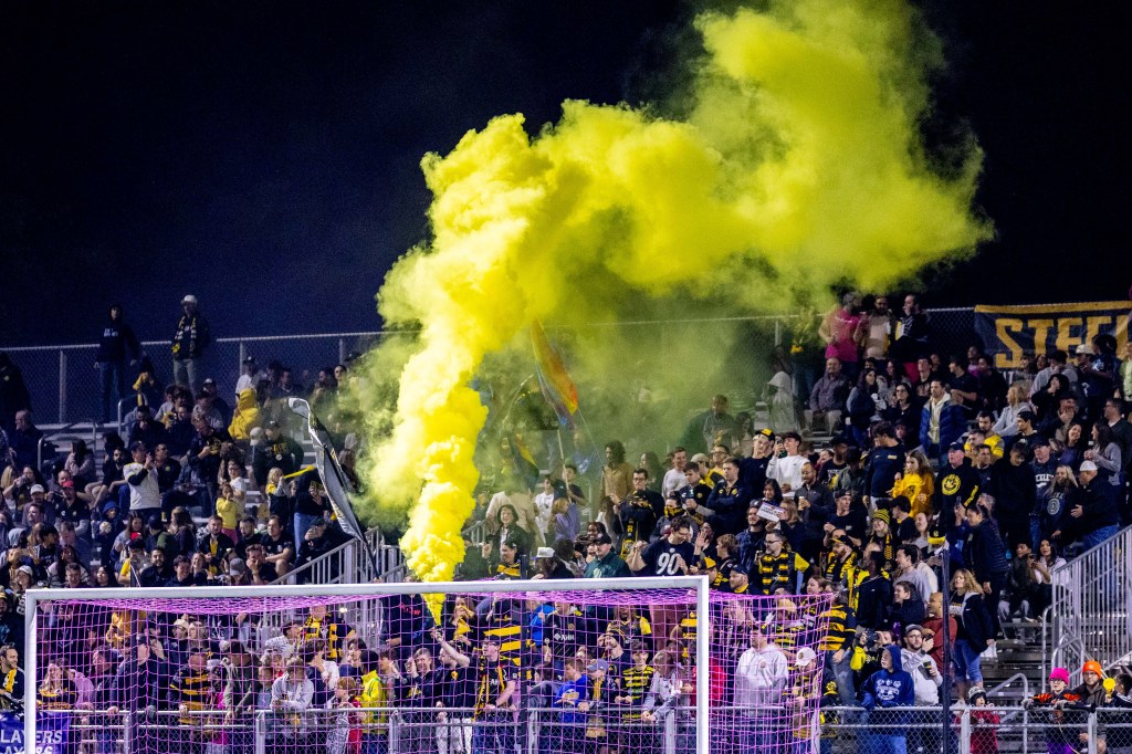 Fans in the Paul Child Stand celebrate during the Pittsburgh Riverhounds' 2-1 win over Indy Eleven on Oct. 11, 2025 at Highmark Stadium in Pittsburgh. (Photo: Chris Cowger/Riverhounds SC)