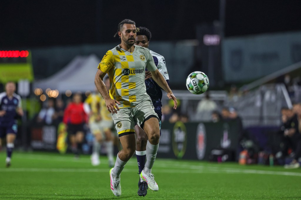 Pittsburgh Riverhounds center back Sean Suber retreats to win the ball in the team's 3-0 win over Monterey Bay FC on Oct. 18, 2025 at Cardinale Stadium in Seaside, Calif. (Photo: Monterey Bay FC)