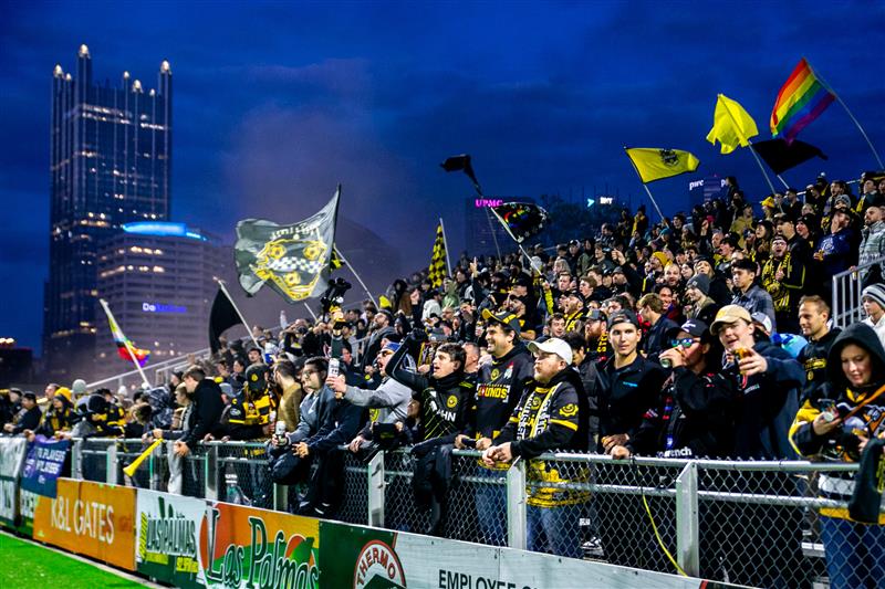 Fans in the Paul Child Stand cheer for the Pittsburgh Riverhounds during their Eastern Conference Quarterfinal victory over Hartford Athletic on Nov. 1, 2025 at Highmark Stadium in Pittsburgh. (Photo: Chris Cowger/Riverhounds SC)