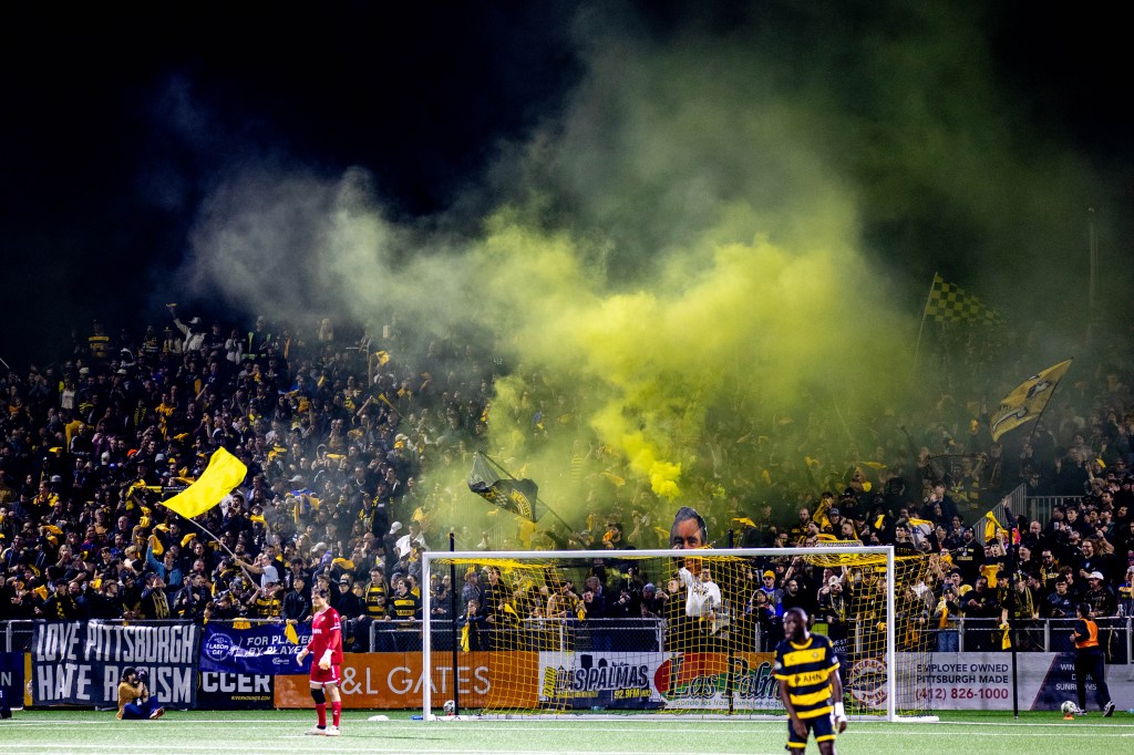 Fans celebrate in the Paul Child Stand during the Pittsburgh Riverhounds' 1-0 win over Rhode Island FC in the USL Championship Eastern Conference Final on Nov. 15, 2025 at Highmark Stadium in Pittsburgh. (Photo: Chris Cowger/Riverhounds SC)