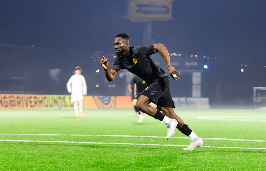 Pittsburgh Riverhounds striker Albert Dikwa makes a run toward goal in the team's preseason match against Duquesne University on Feb. 18, 2026 at Highmark Stadium. (Photo: John Sykes/Riverhounds SC)