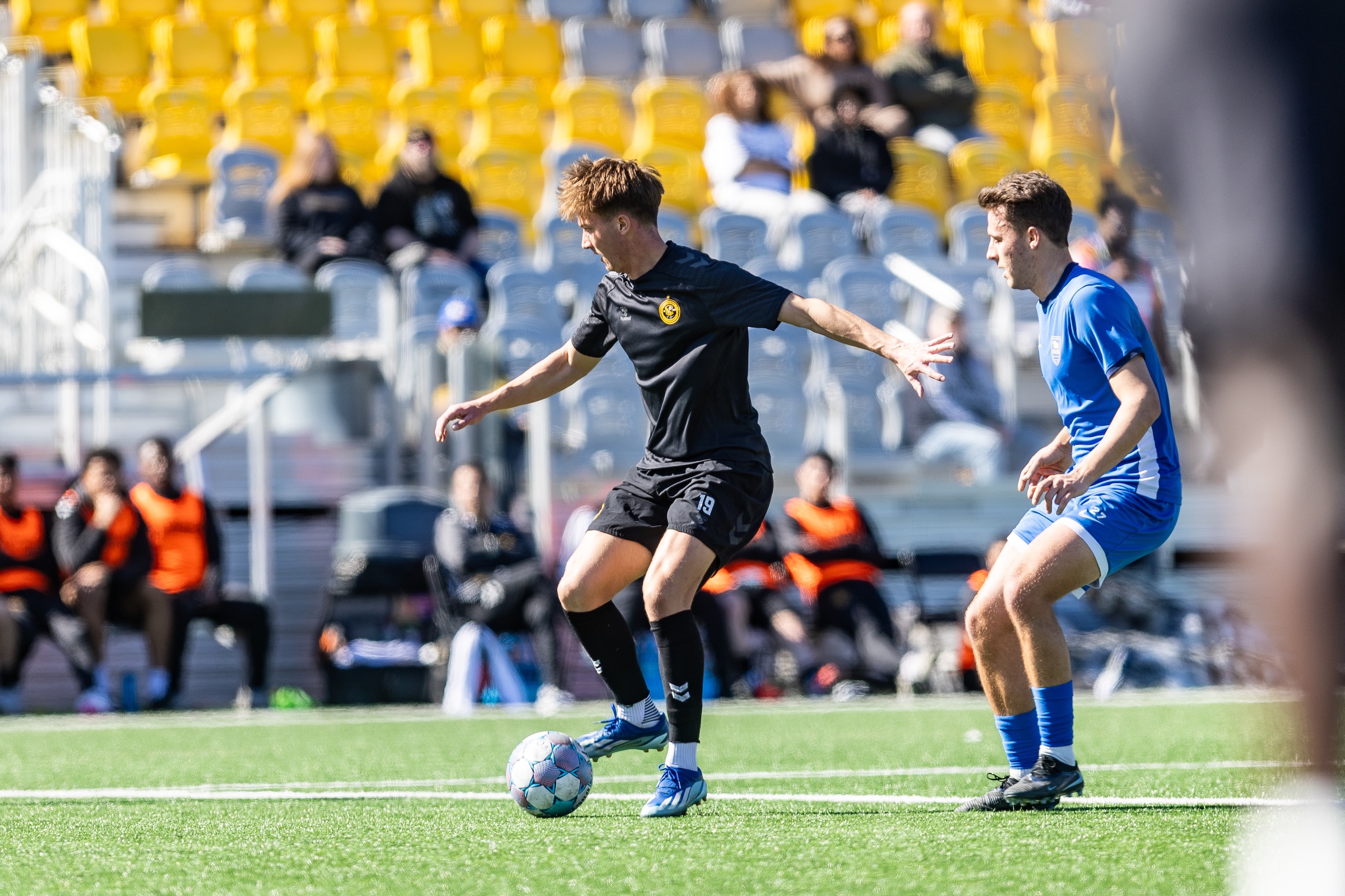 Sam Bassett controls the ball in the Pittsburgh Riverhounds' 2-0 preseason win over the University of Pittsburgh on Feb. 28, 2026 at Highmark Stadium in Pittsburgh. (Photo: Mallory Neil/Riverhounds SC)