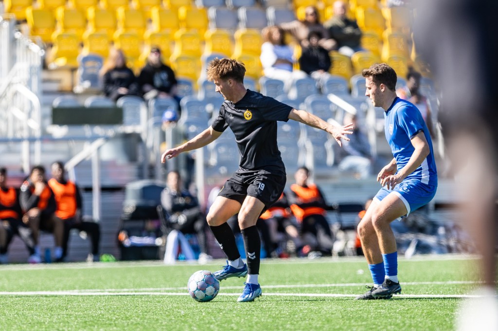 Sam Bassett controls the ball in the Pittsburgh Riverhounds' 2-0 preseason win over the University of Pittsburgh on Feb. 28, 2026 at Highmark Stadium in Pittsburgh. (Photo: Mallory Neil/Riverhounds SC)