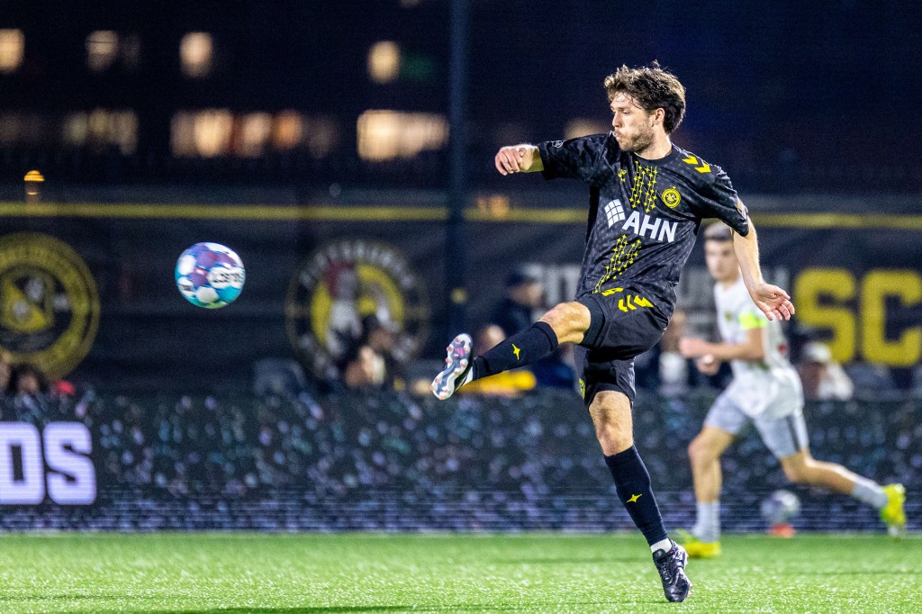 Bradley Sample volleys the ball forward in the Pittsburgh Riverhounds' U.S. Open Cup win over Steel City FC on March 25, 2026 at Highmark Stadium in Pittsburgh. (Photo: Chris Cowger/Riverhounds SC)
