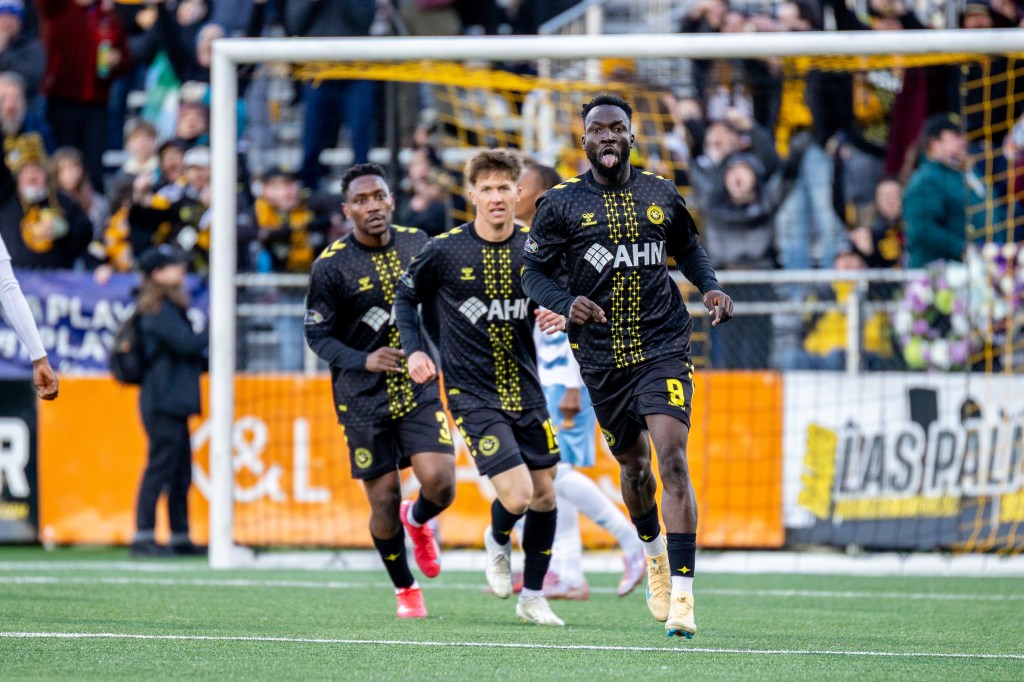 Albert Dikwa celebrates his first goal in the Pittsburgh Riverhounds' 3-2 win over Sporting Club Jacksonville on March 28, 2026 at Highmark Stadium in Pittsburgh. (Photo: Chris Cowger/Riverhounds SC)