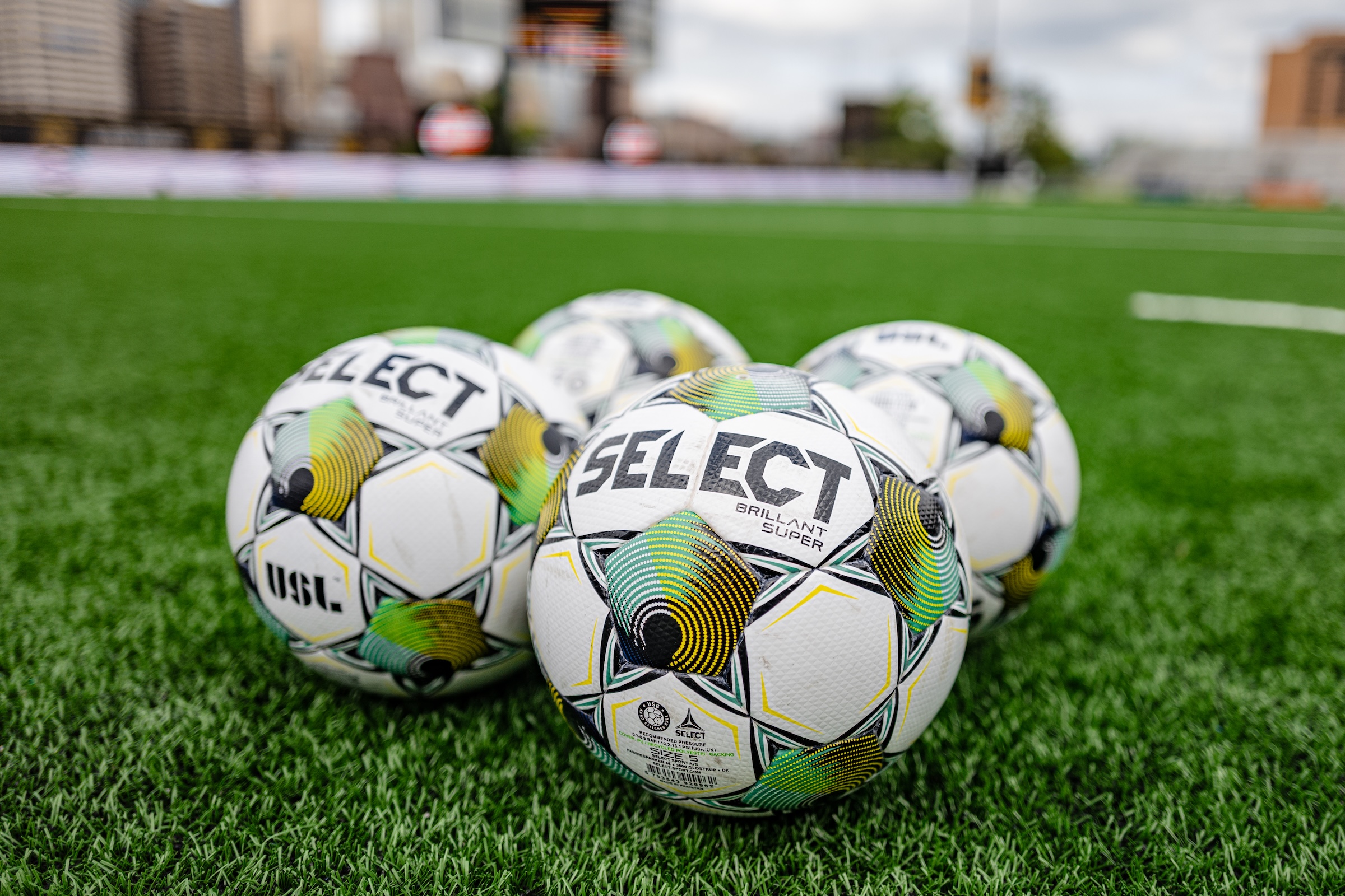 Select soccer balls on the turf at Highmark Stadium, Pittsburgh.