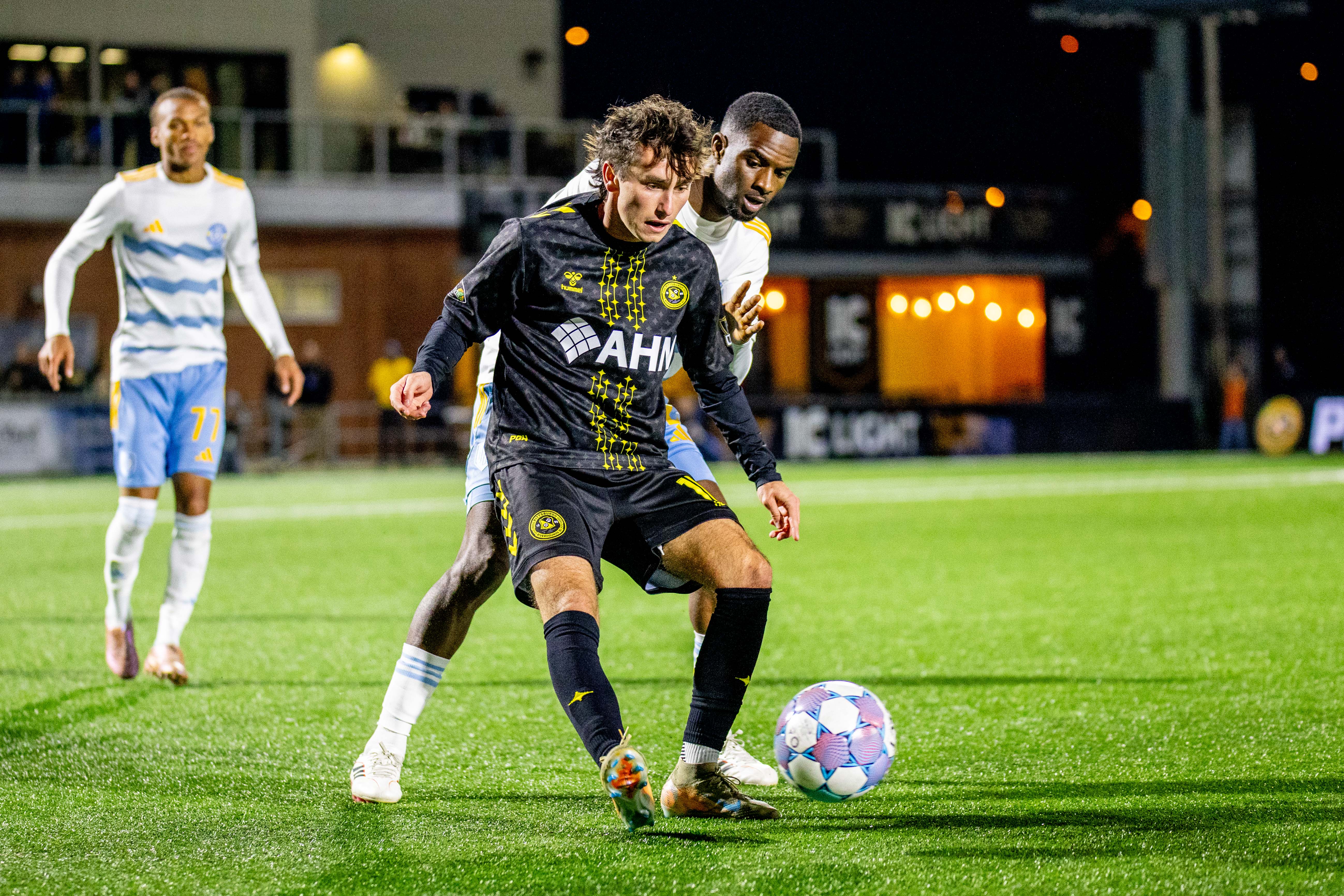 Charles Ahl plays a pass in the Pittsburgh Riverhounds' 3-2 win over Sporting Jacksonville on March 28, 2026 at Highmark Stadium in Pittsburgh. (Photo: Chris Cowger/Riverhounds SC)