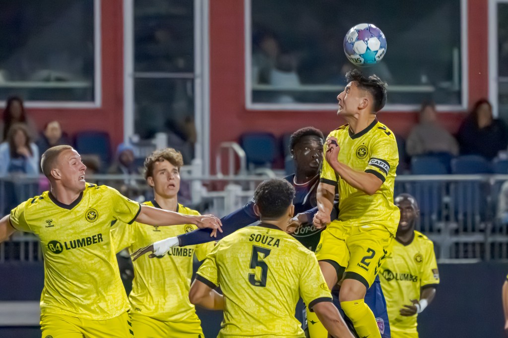 Danny Griffin wins a header in a crowd of players during the Pittsburgh Riverhounds' 1-1 draw with Indy Eleven on April 4, 2026 at Michael A. Carroll Stadium in Indianapolis. (Photo: Matt Schlotzhauer/Indy Eleven)