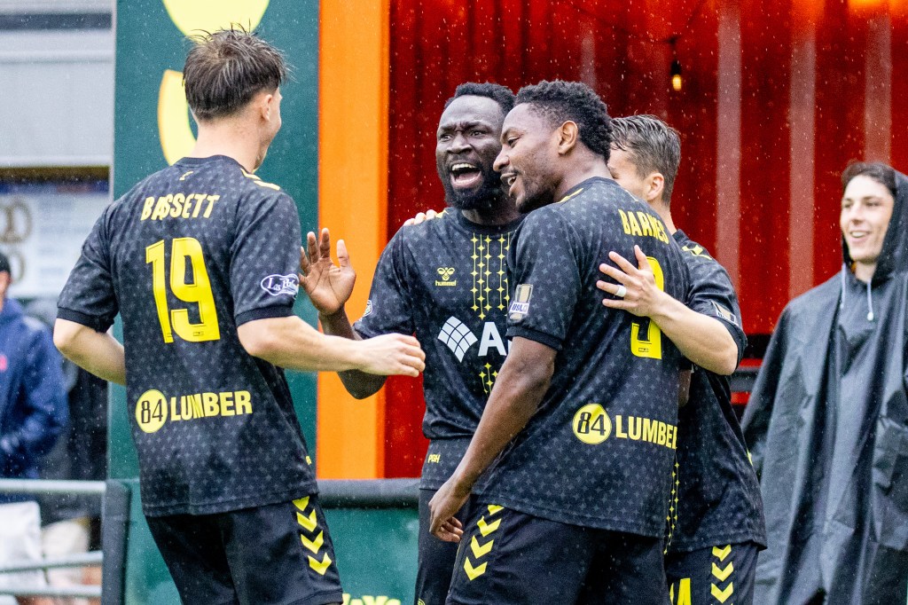 Albert Dikwa celebrates with his teammates after scoring the opening goal in the Pittsburgh Riverhounds' 2-1 win over Detroit City FC on April 18, 2026 at Highmark Stadium in Pittsburgh. (Photo: Chris Cowger/Riverhounds SC)