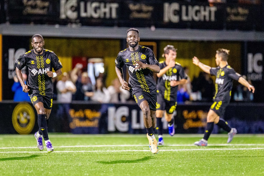 Albert Dikwa leads teammates in celebration after his second goal in a 2-0 win over Detroit City FC on April 18, 2026 at Highmark Stadium in Pittsburgh. (Photo: Chris Cowger/Riverhounds SC)
