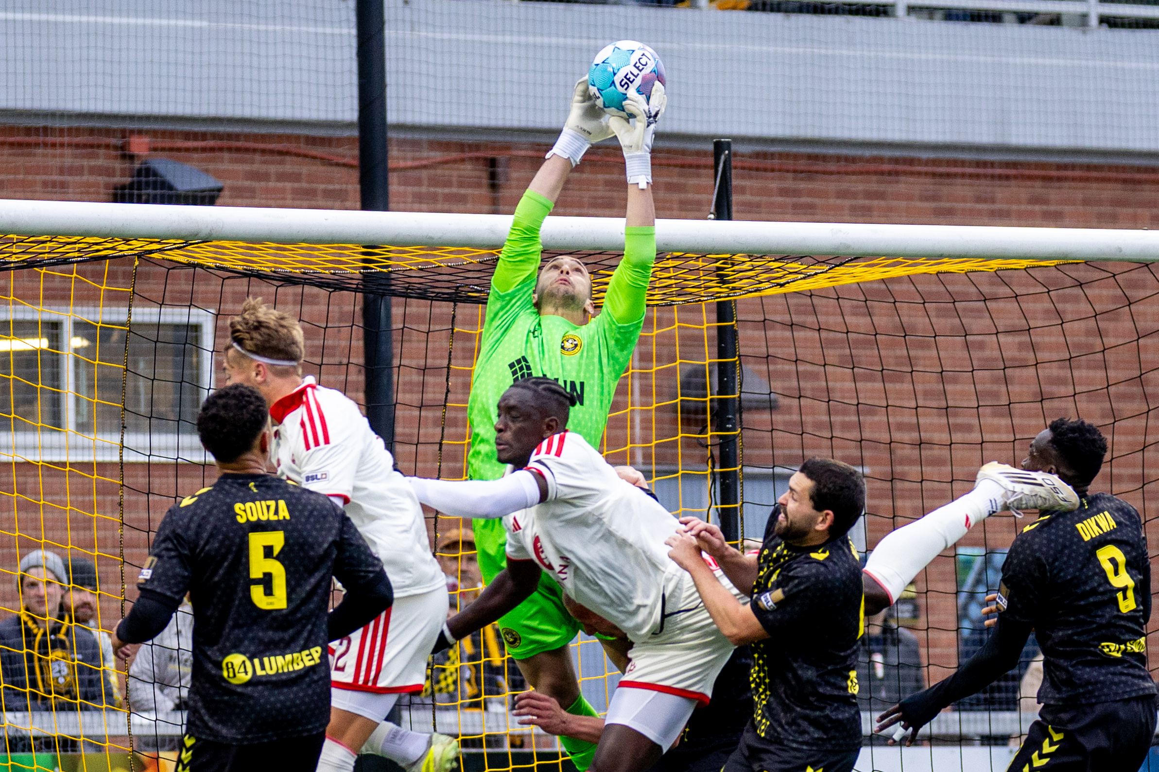 Pittsburgh Riverhounds goalkeeper Nico Campuzano rises above a crowd of players to catch a corner kick in the team's match against Phoenix Rising FC on May 2, 2026 at F.N.B. Stadium in Pittsburgh. (Photo: Chris Cowger/Riverhounds SC)