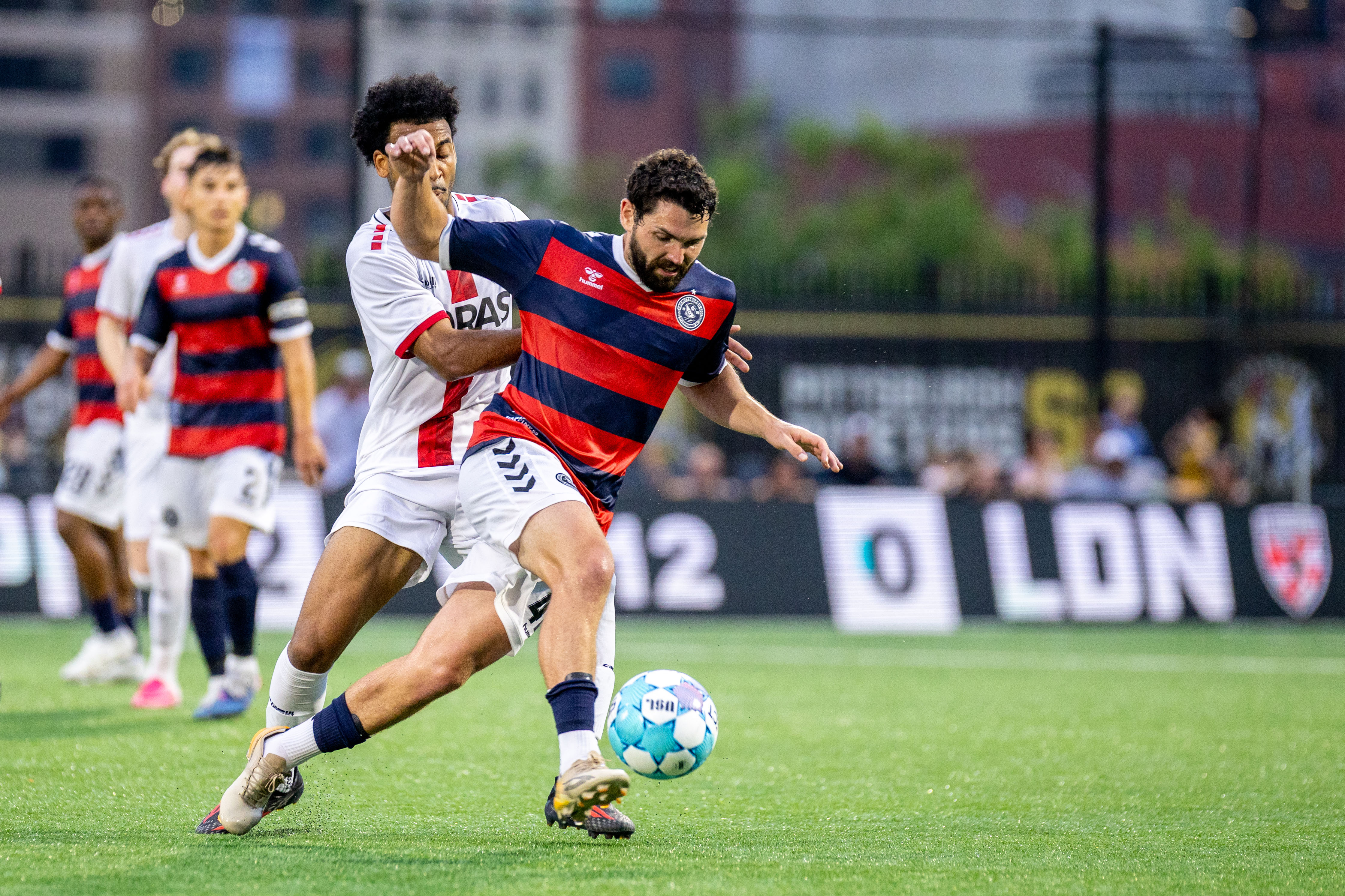 Jackson Walti carries the ball out of danger in the Pittsburgh Riverhounds' 2-0 win over Loudoun United FC on July 11, 2026 at F.N.B. Stadium in Pittsburgh. (Photo: Chris Cowger/Riverhounds SC)