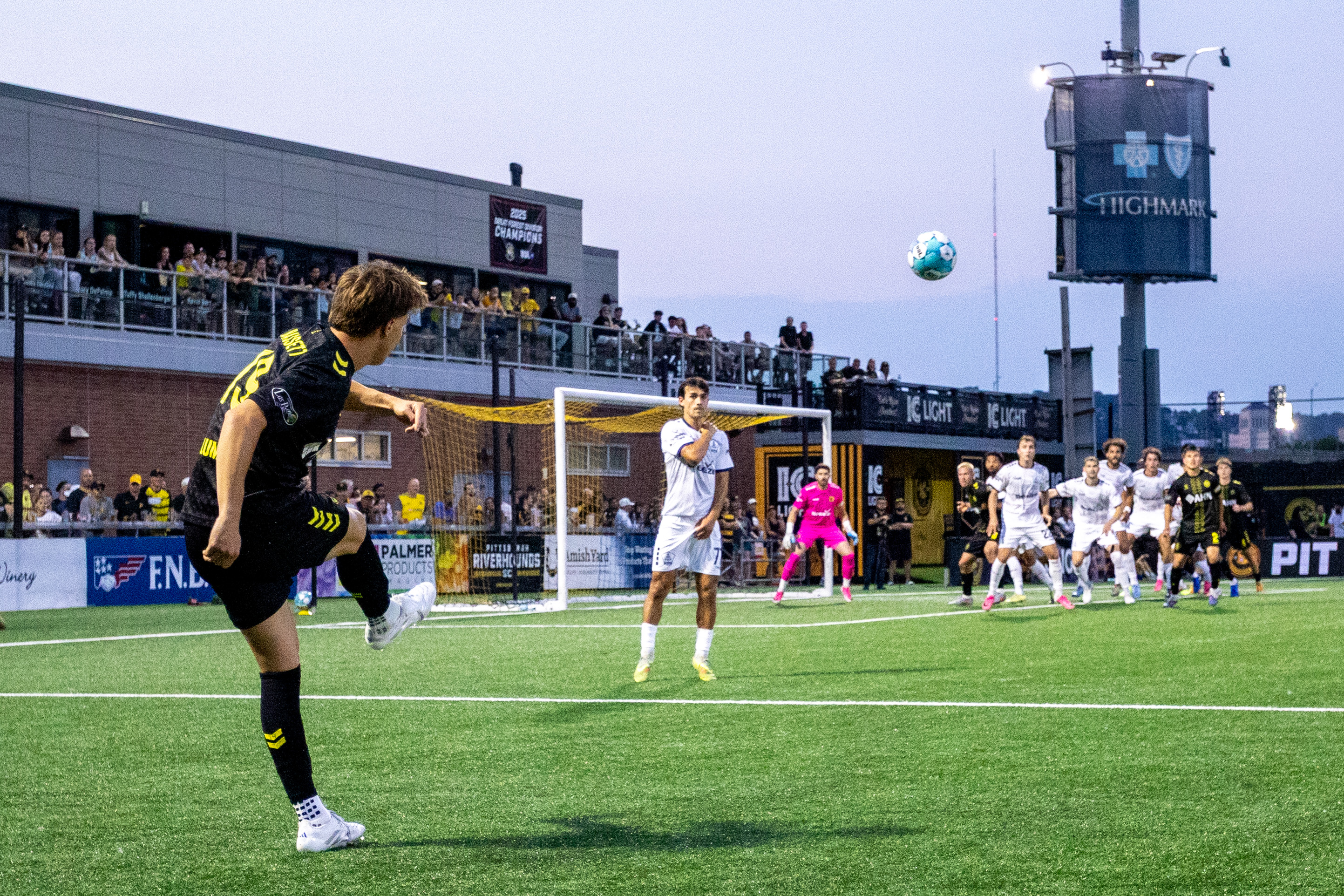 Sam Bassett delivers a free kick for the Pittsburgh Riverhounds in their match against Rhode Island FC on July 25, 2026 at F.N.B. Stadium in Pittsburgh. (Photo: Chris Cowger/Riverhounds SC)