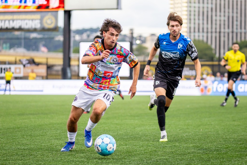 Charles Ahl dribbles away from pressure in the Pittsburgh Riverhounds' match against FC Tulsa on July 29, 2026 at F.N.B. Stadium in Pittsburgh. (Photo: Chris Cowger/Riverhounds SC)