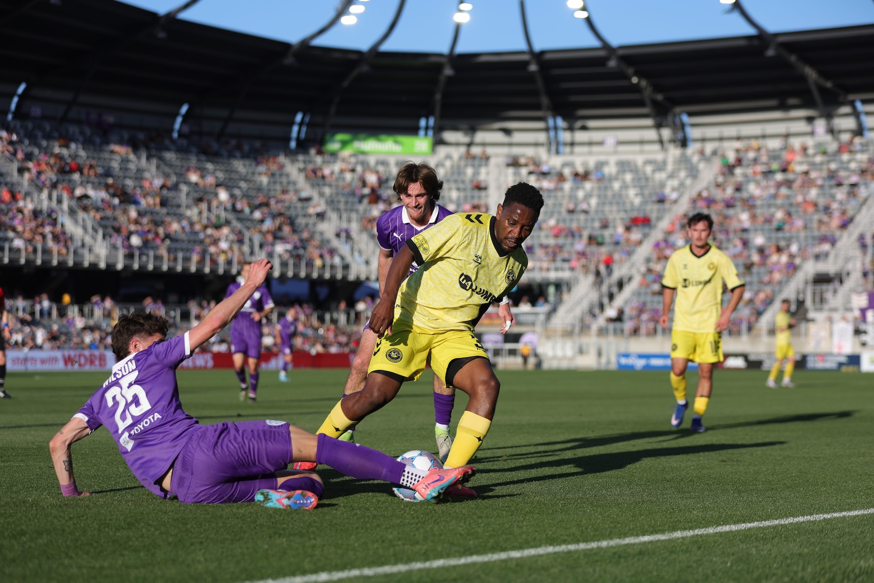 Perrin Barnes takes the ball off Louisville City's Jansen Wilson in the Pittsburgh Riverhounds' 2-0 win on May 9, 2026 at Lynn Family Stadium in Louisville, Ky. (Photo: EM Dash Photography/Louisville City FC)