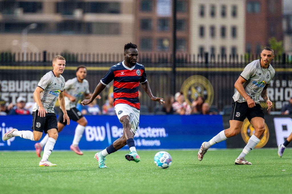 Albert Dikwa plays a pass in the Pittsburgh Riverhounds match against Brooklyn FC on July 4, 2026 at F.N.B. Stadium in Pittsburgh. (Photo: Chris Cowger/Riverhounds SC)