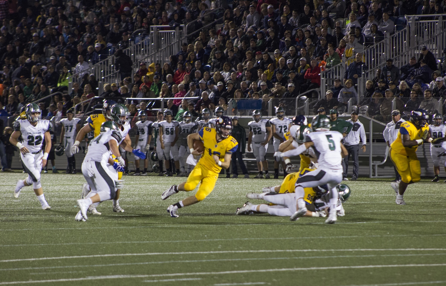 Central Catholic quarterback Troy Fisher carries the ball in a high school football game against Pine-Richland on Sept. 30, 2016 at Highmark Stadium in Pittsburgh. (Riverhounds SC file photo)