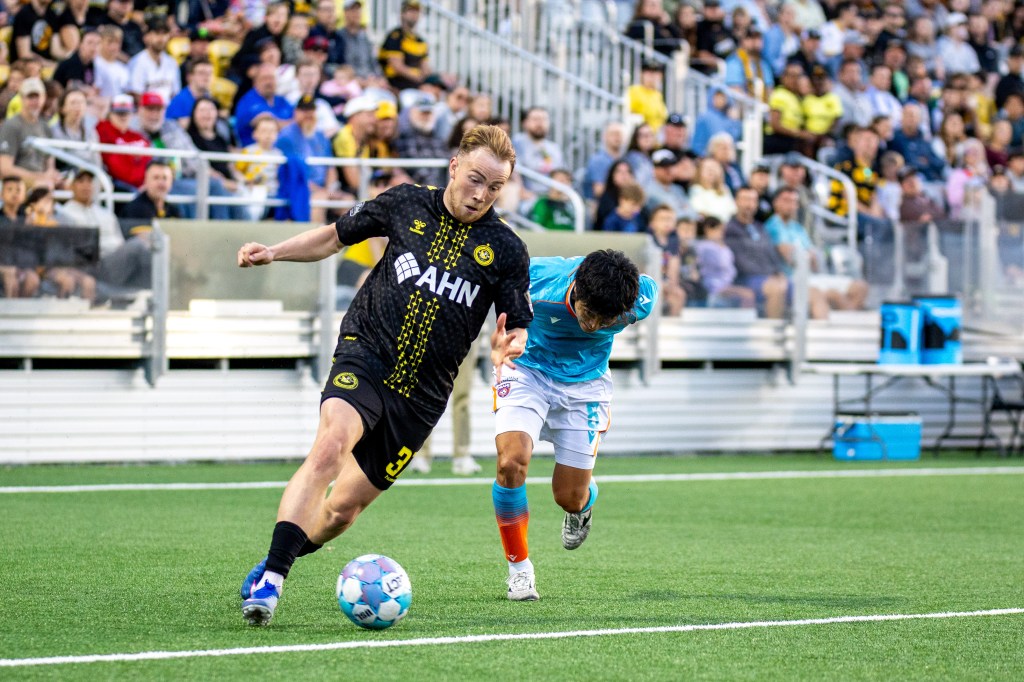 Eliot Goldthorp pulls away from Miami FC's Riyon Tori in the Pittsburgh Riverhounds' 2-0 win on May 30, 2026 at F.N.B. Stadium in Pittsburgh. (Photo: Chris Cowger/Riverhounds SC)
