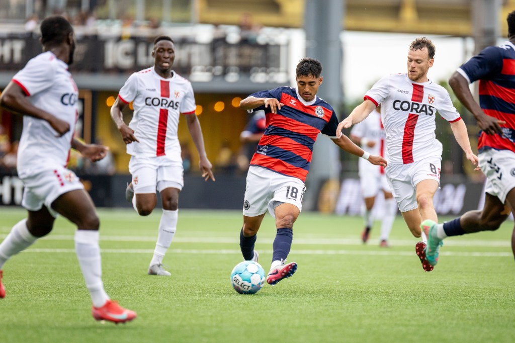 Jorge Garcia plays a pass between Loudoun United FC defenders in the Pittsburgh Riverhounds' 2-0 win on July 11, 2026 at F.N.B. Stadium in Pittsburgh. (Photo: Chris Cowger/Riverhounds SC)