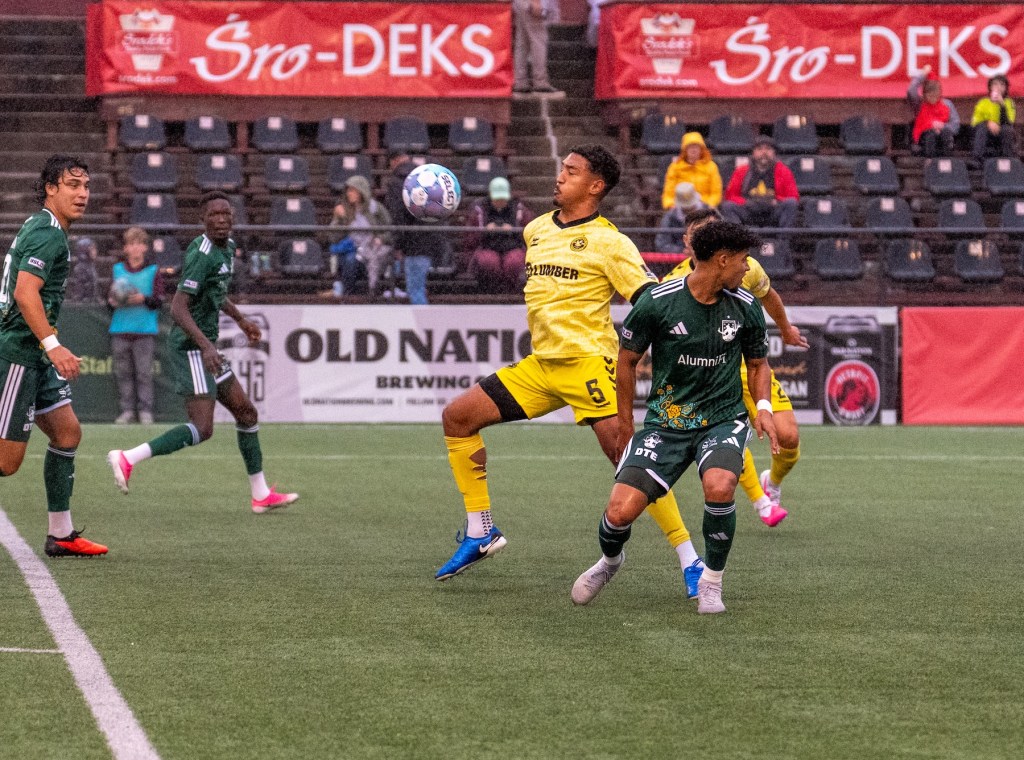Victor Souza wins the ball beside Detroit City FC's Darren Smith in the Pittsburgh Riverhounds' match Sept. 19, 2026 at Keyworth Stadium in Hamtramck, Mich. (Photo: Detroit City FC)