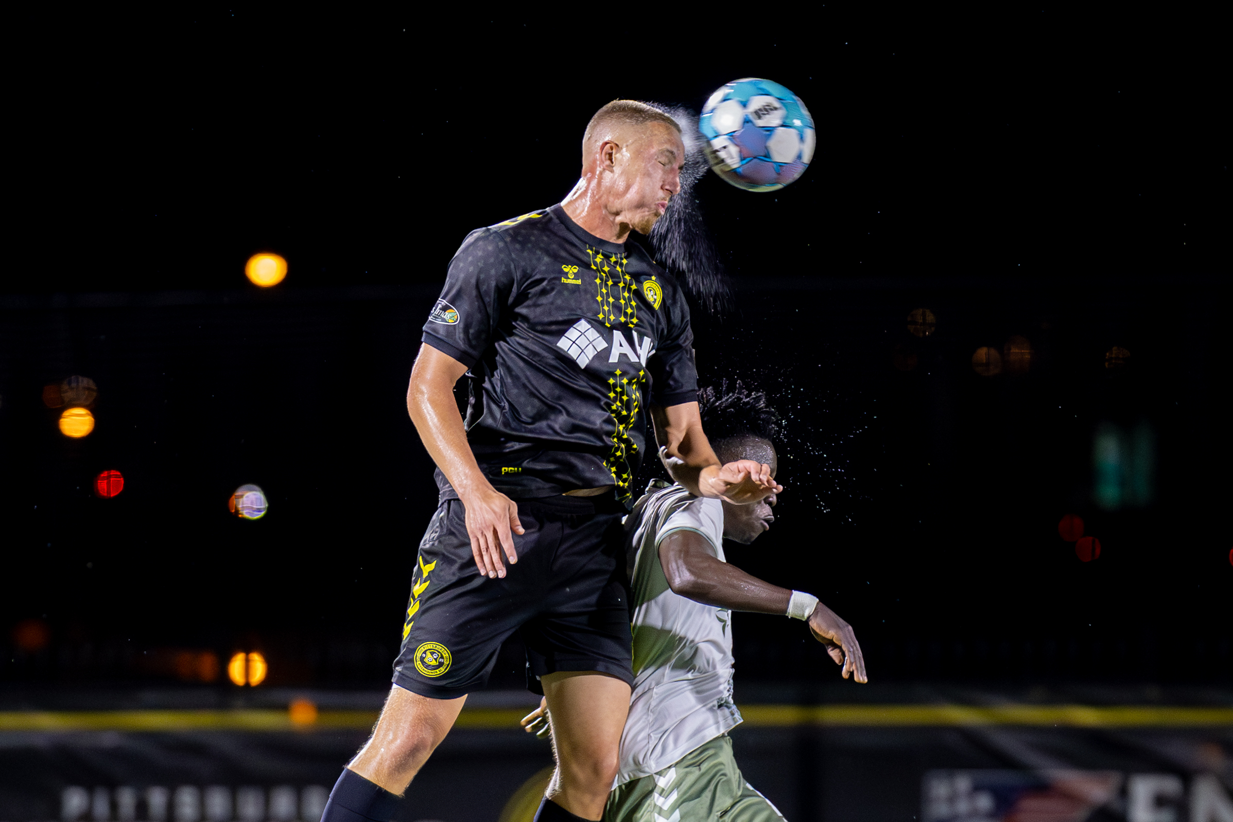 Pittsburgh Riverhounds defender Owen Mikoy leaps to head the ball in the rain during his team's 2-1 win over Hartford Athletic on Oct. 10, 2026 at F.N.B. Stadium in Pittsburgh. (Photo: Chris Cowger/Riverhounds SC)