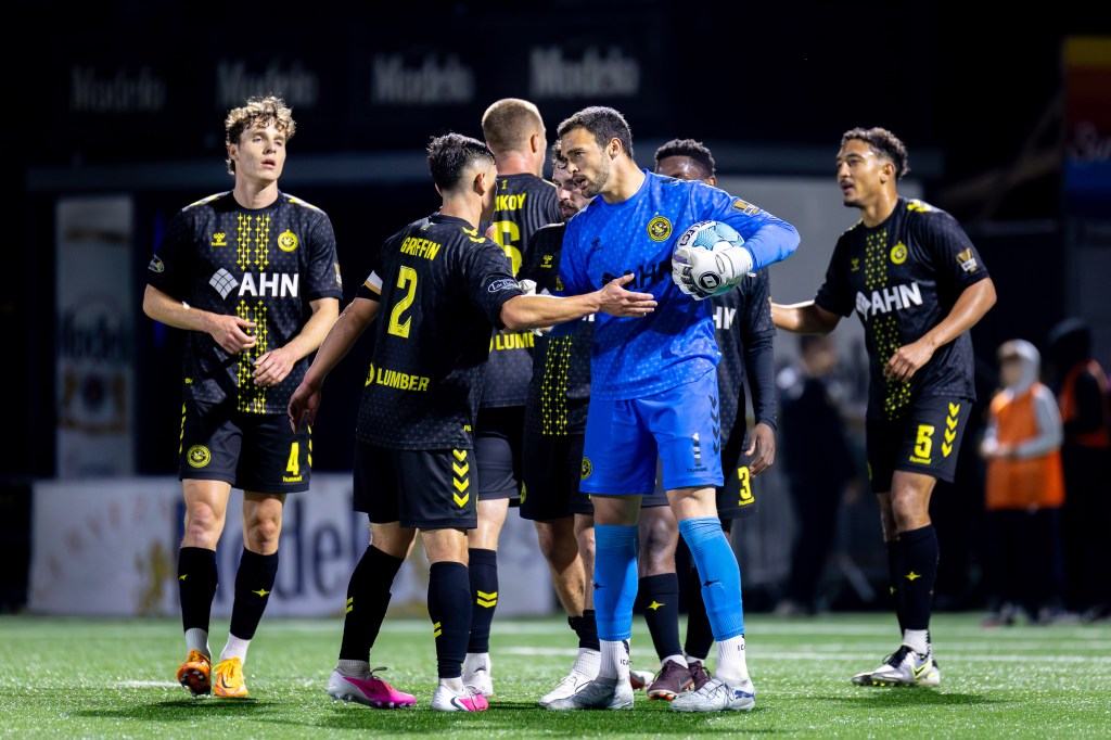 Goalkeeper Nico Campuzano celebrates with Danny Griffin (2) at the end of the Pittsburgh Riverhounds' 2-1 win over Birmingham Legion FC on Oct. 24, 2026 at F.N.B. Stadium in Pittsburgh. (Photo: Chris Cowger/Riverhounds SC)